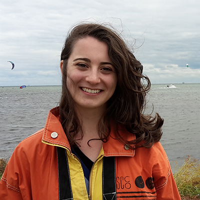 Photo of Halley Rose Meslin with a body of water in the background